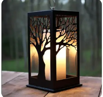 Farol metálico con corte láser de árbol